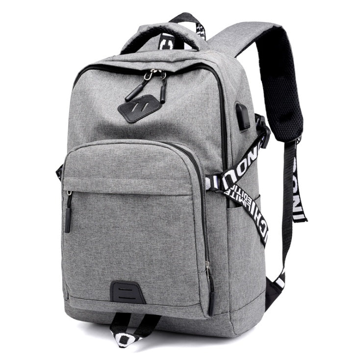 Gray backpack with visible brand logo on a white background.