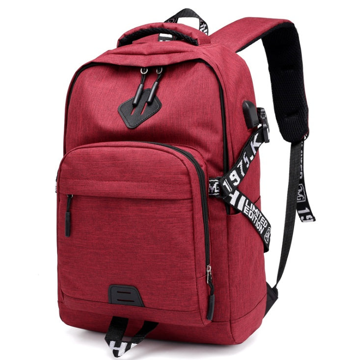 Red backpack with visible brand logo on a white background.