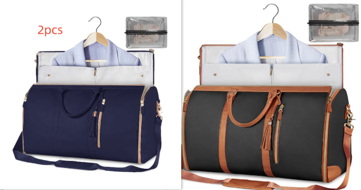 Two bags with clothing items inside, one navy and one black with brown handles, on a white background.