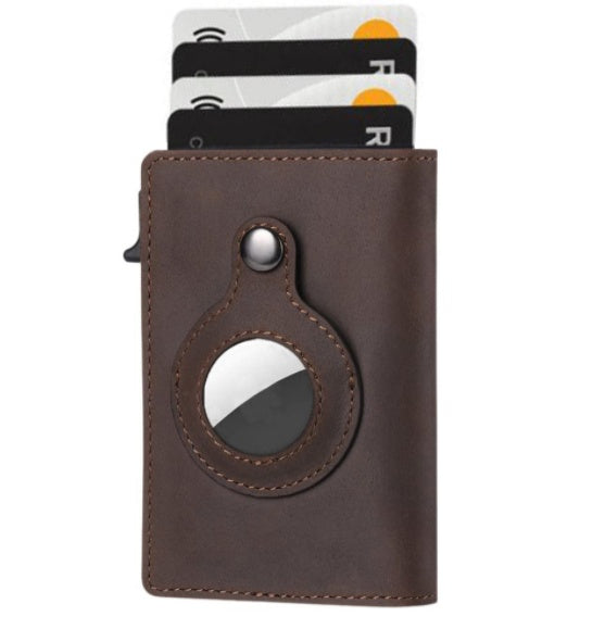 Brown leather cardholder with metallic accents on white background.