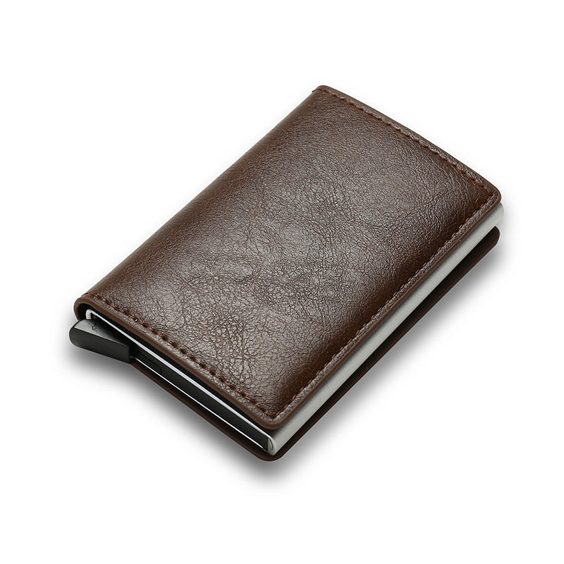 Brown leather smart cardholder with metal clip on white background.