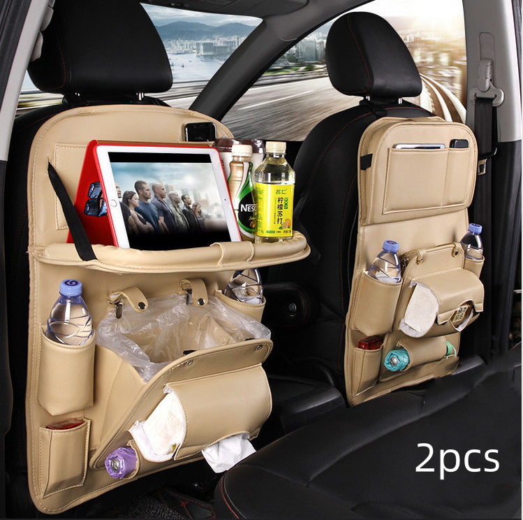 Car back seat organizer with multiple pockets and a tablet stand, placed inside a vehicle.