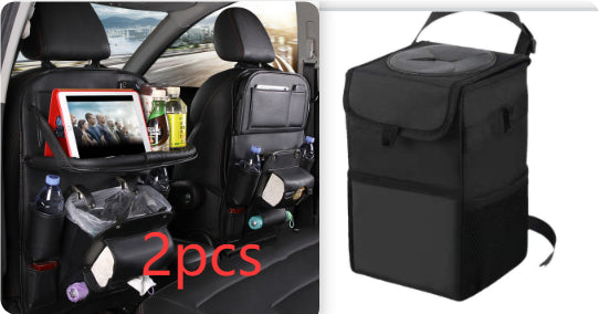 Car organizer with tablet holder, drink bottles, and snacks on a car seat, next to a black insulated lunch bag.