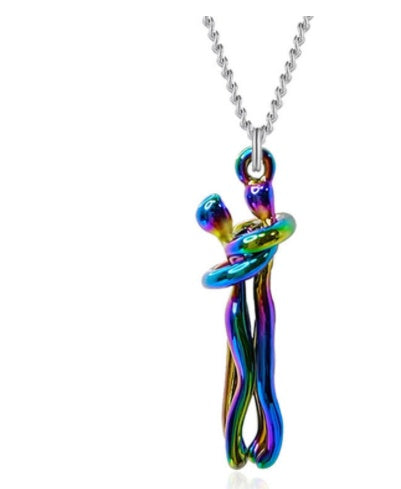 Multicolored pendant on a silver chain against a white background.