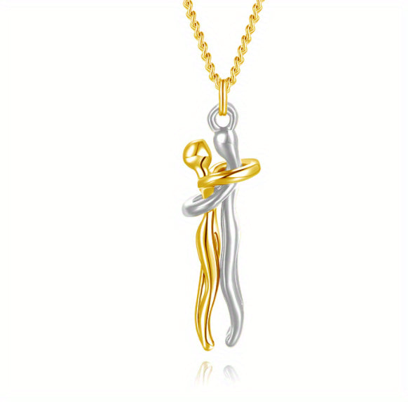 Two-tone gold and silver pendant on a white background.