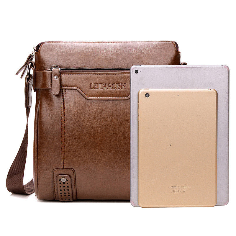 Khaki leather bag with «LEINASEN» branding next to two tablets on white background.