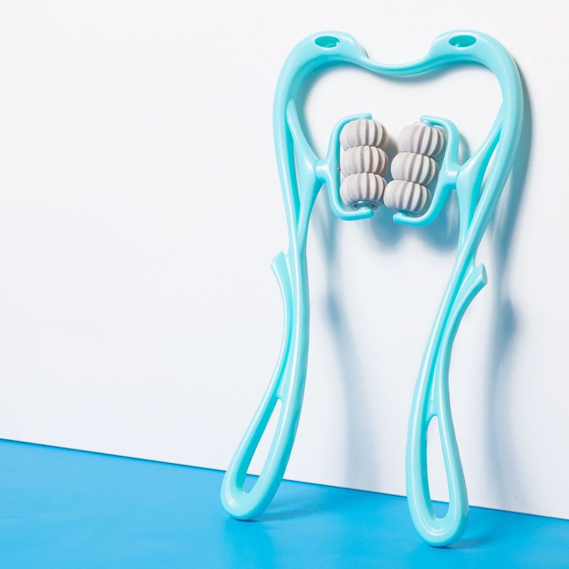 Light blue facial roller with white massage stones on a white background.