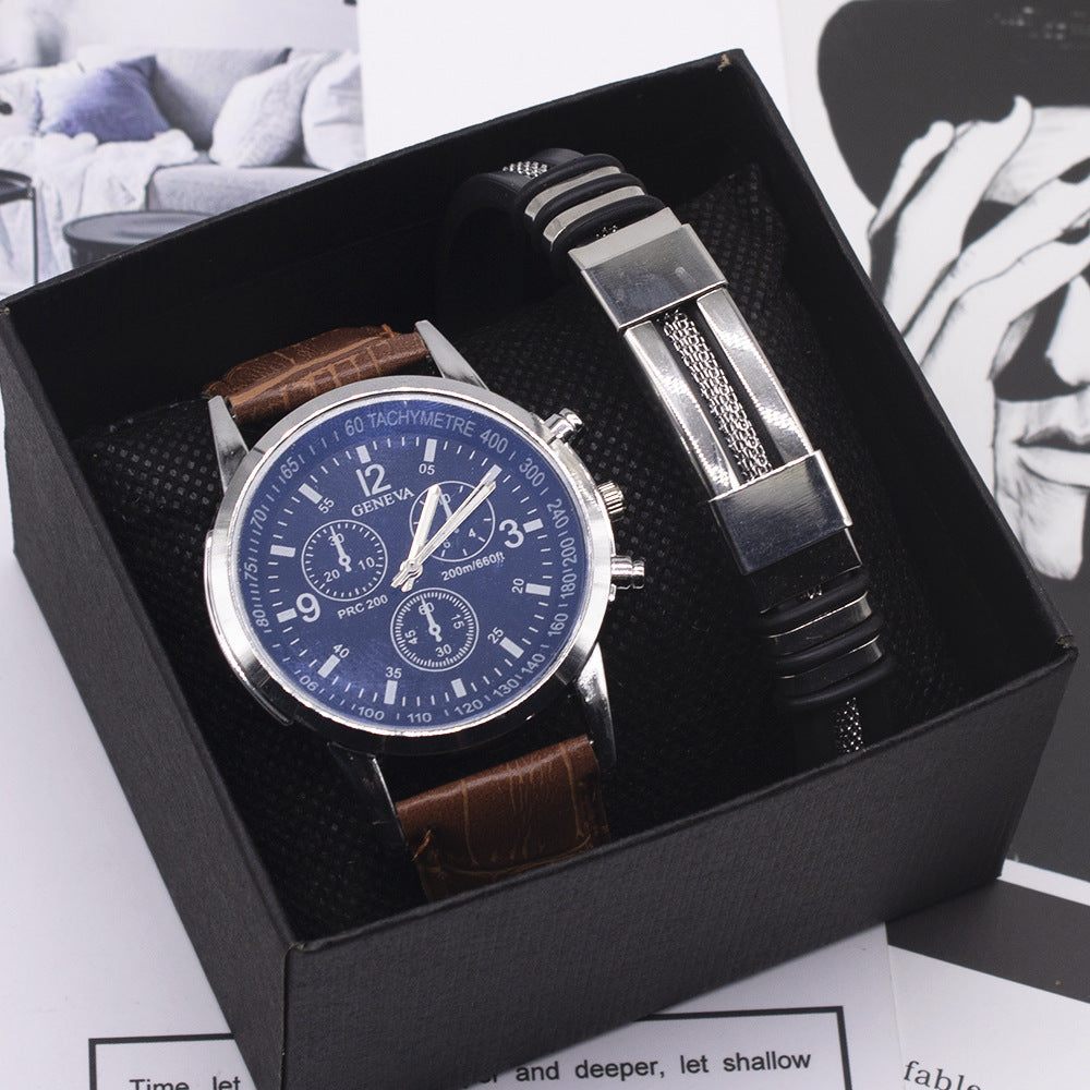 Men´s watch with brown leather strap, blue dial and silver bracelet in a black box.