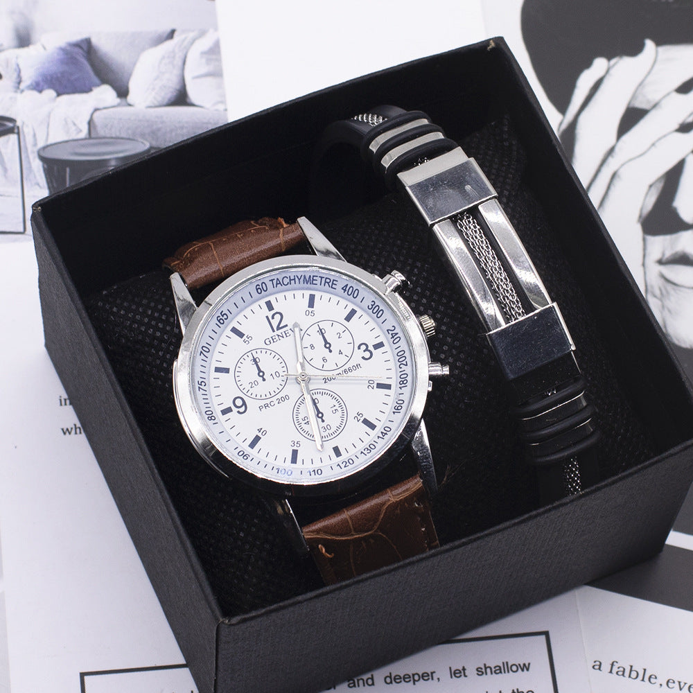 Men´s watch with brown leather strap, white dial and silver bracelet in a black box.