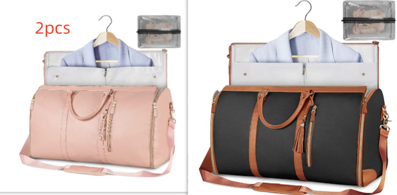 Two duffel bags, one pink and one black with brown handles, on hangers with shirts inside.