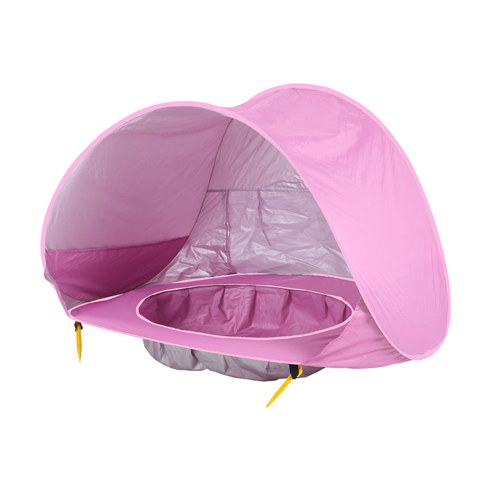 Pink baby tent with canopy on a white background.