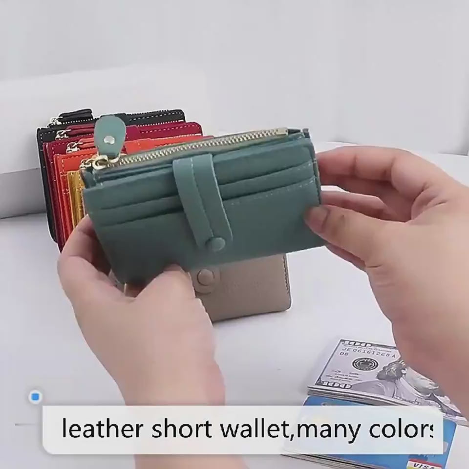 Video showing multiple leather short wallets in various colors.