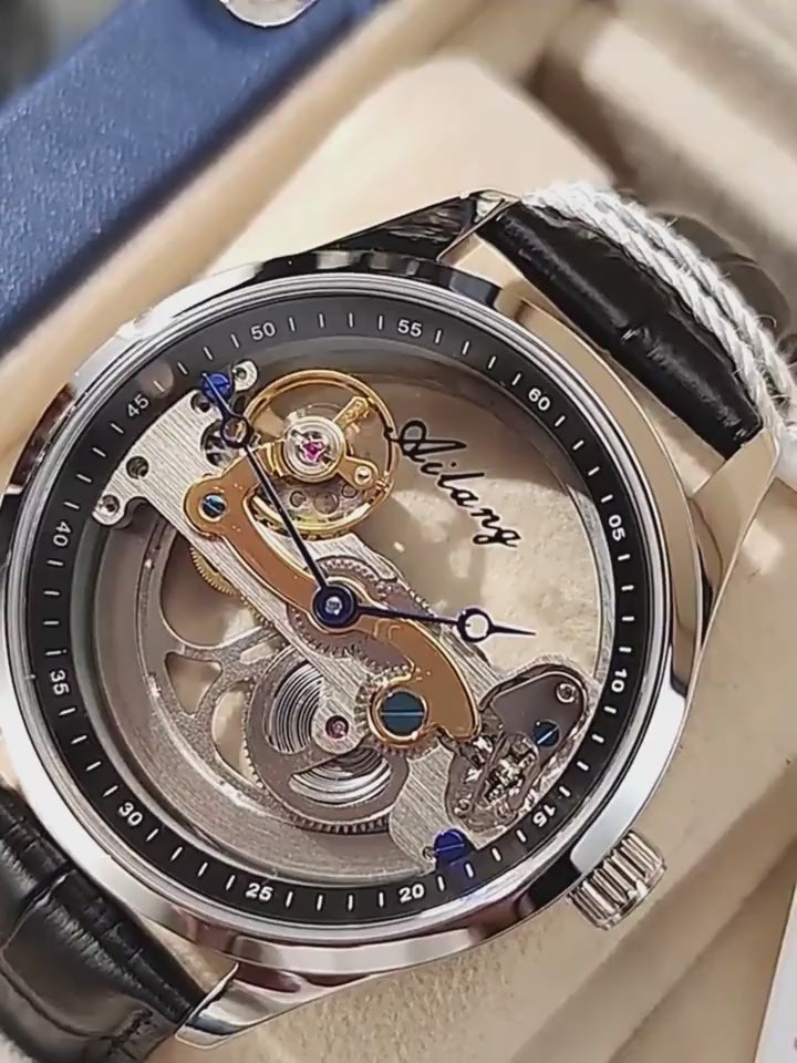 Man in white gloves unboxing luxury men’s wristwatch in a presentation box, showing a silver-tone watch with leather strap, close-up views of the leather band, inner strap details, and the watch mechanism.