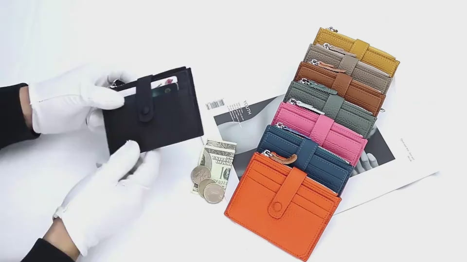Hands demonstrating leather short wallets in multiple colors, highlighting design and sorage.