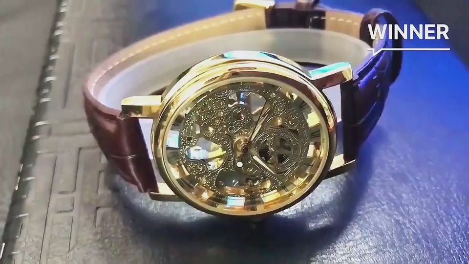 Video showing a luxury mechanical men´s watch with intricate skeleton movement and gold-tone case.