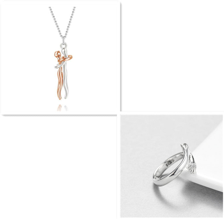 Two pieces of jewelry: a necklace with a dancing figure pendant and a ring with a similar design on a white background.