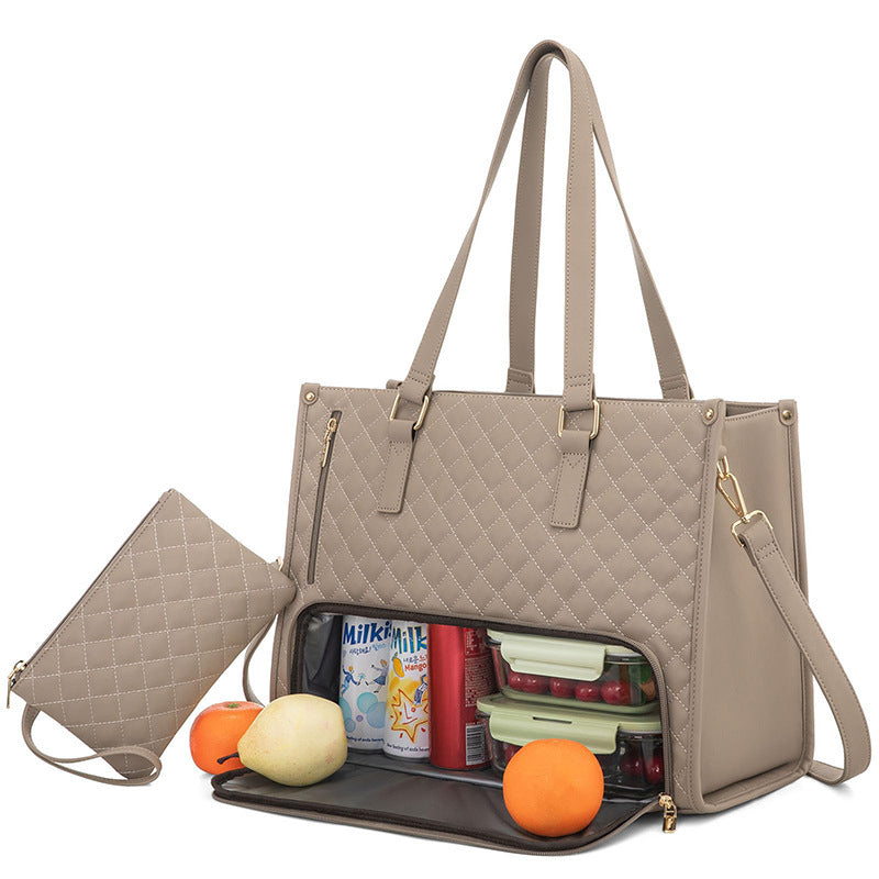 Quilted beige tote bag with compartments open, showing items inside on a white background.