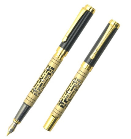 Two yellow bronze pens on a white background.