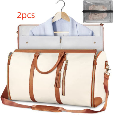 White travel bag with brown accents and a hanger with a shirt and pouch on a white background with «2pcs» text.